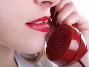 woman in red lipstick on red phone